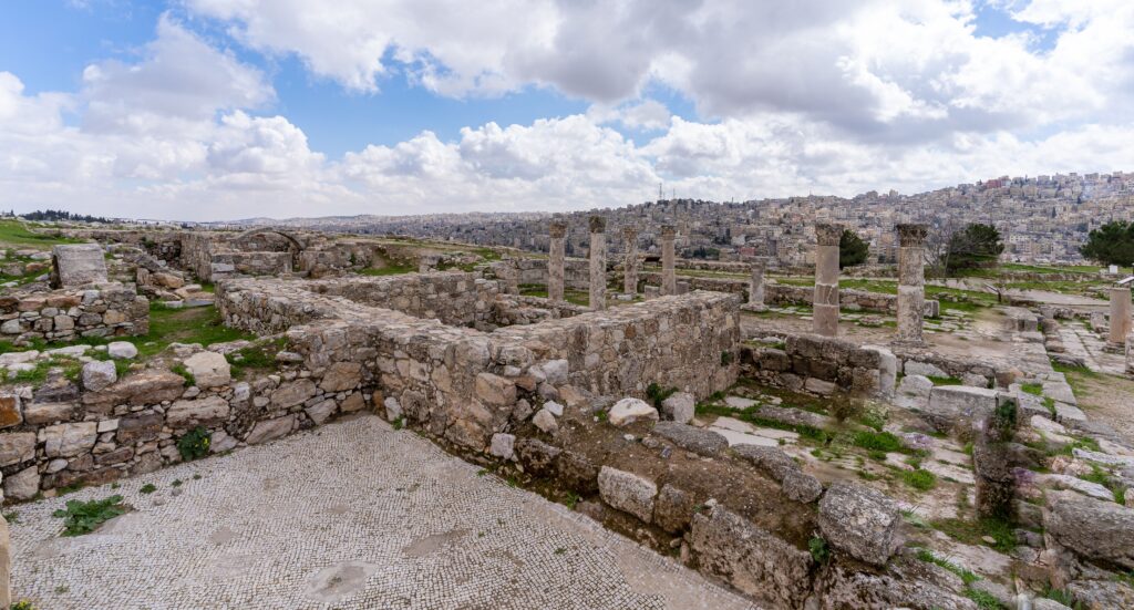 Explore the historical Amman Citadel ruins with ancient stone structures and panoramic city views.